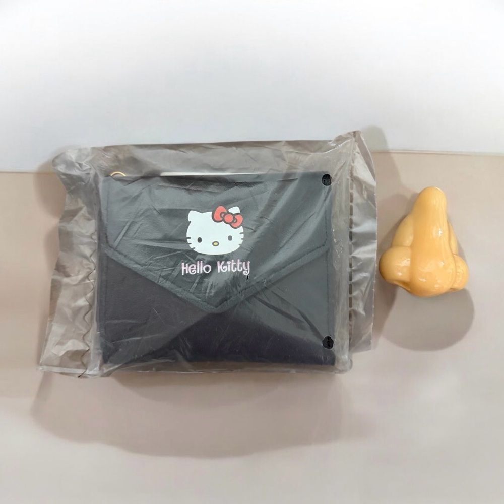 Hello Kitty Black Wallet and Nose Pencil Sharpener